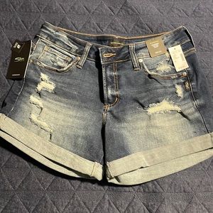 BNWT Silver distressed boyfriend mid-rise shorts. Size 28